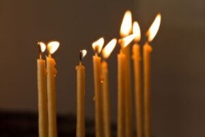 thin-candles-in-church