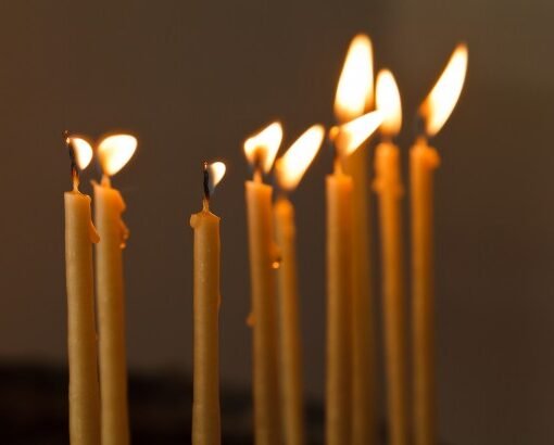 thin-candles-in-church